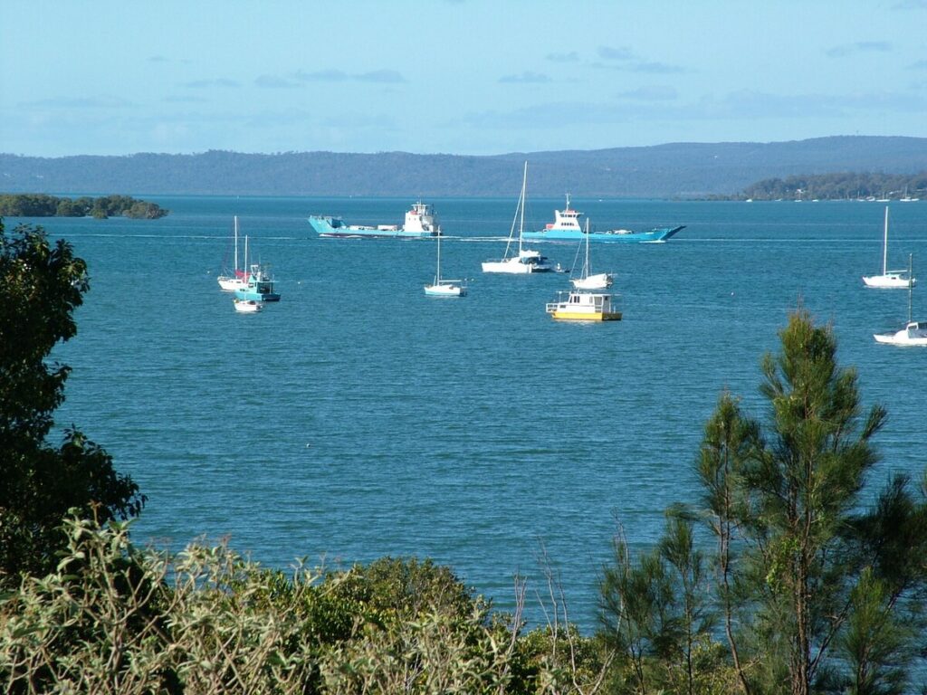 Image of ferries moving across Redland Bay