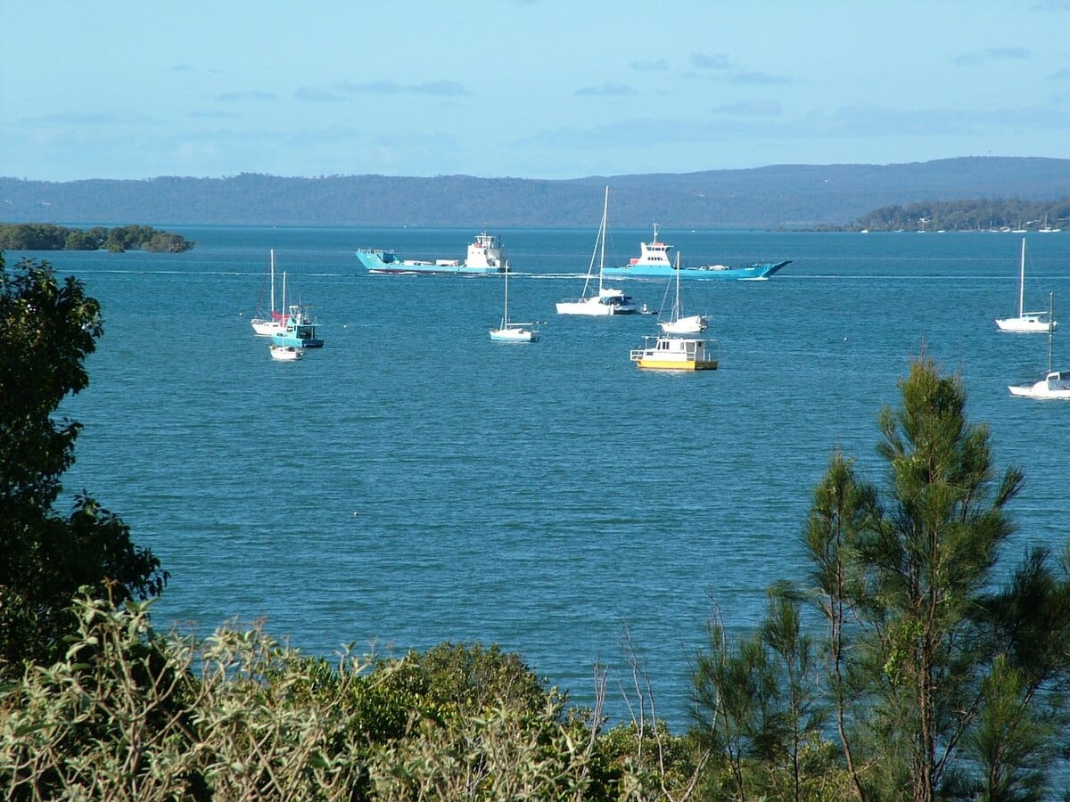 Image of ferries moving across Redland Bay